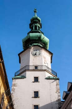 Clock tower at the St. Michael's Gate, Bratislava, Slovakia.