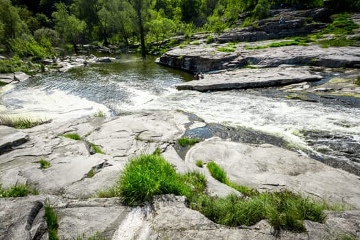 Landscape of fast mountain rivers and large rocks