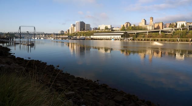 The sun rises hitting the buildings of North Tacoma Washington United States