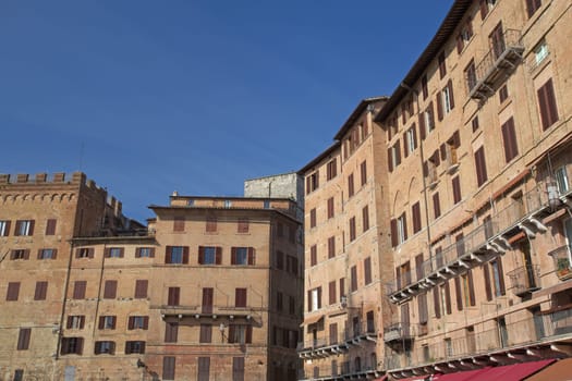 The houses surrounding the famous Piazza del Campo  (Siena, Tuscany, Italy)
