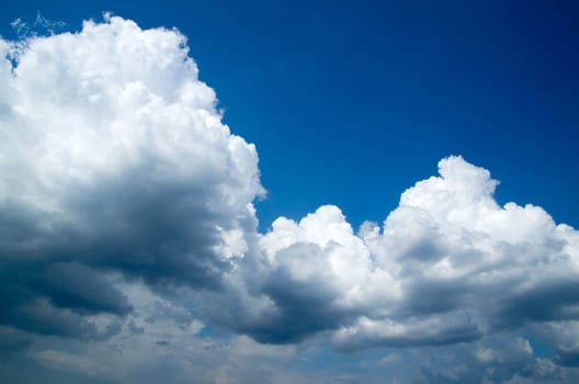 blue sky background with tiny clouds