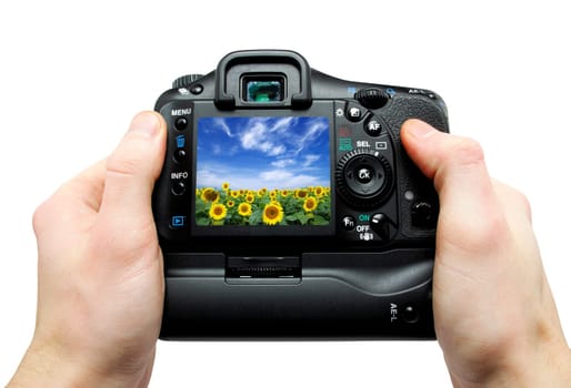 black digital camera in hands