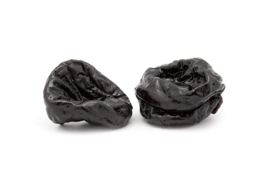Prunes on a white background