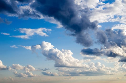 Blue sky background with a tiny clouds