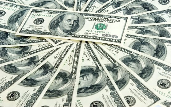 Money background from hundreds dollars