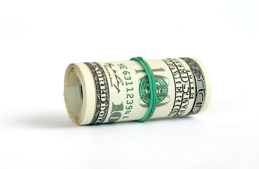 Roll of dollars close-up against white background.