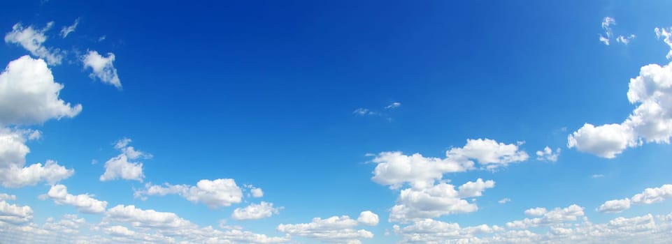 blue sky background with tiny clouds