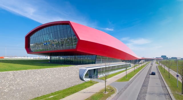 The wall, a red shopping mall and noise barrier along the A2 highway in Utrecht, Netherlands. With 800 meter this is also the longest building in the netherlands