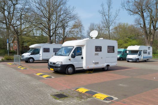 several motor-homes on a parking place