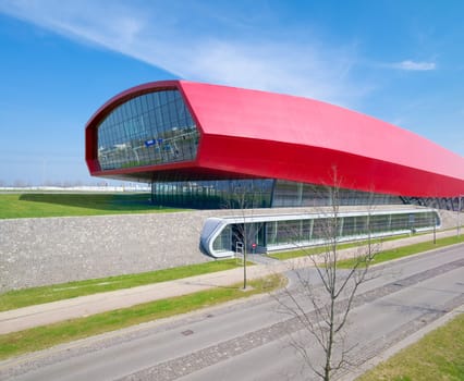 The wall, a red shopping mall and noise barrier along the A2 highway in Utrecht, Netherlands. With 800 meter this is also the longest building in the netherlands