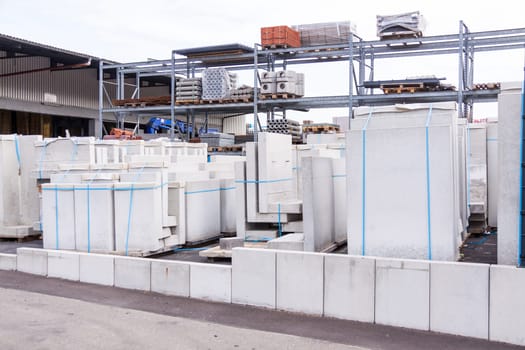 Drywall material in an outdoor warehouse on an industrial site