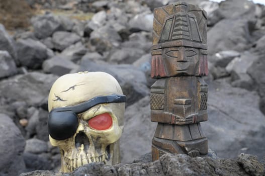 Ancient Maya Statue on the Rocks near Ocean