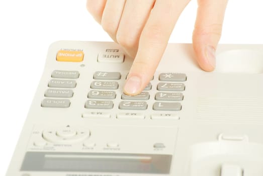 finger with  white telephone keypad