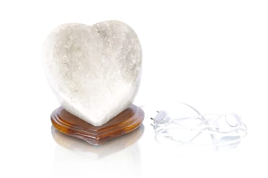 Salt rock lamp isolated over white background