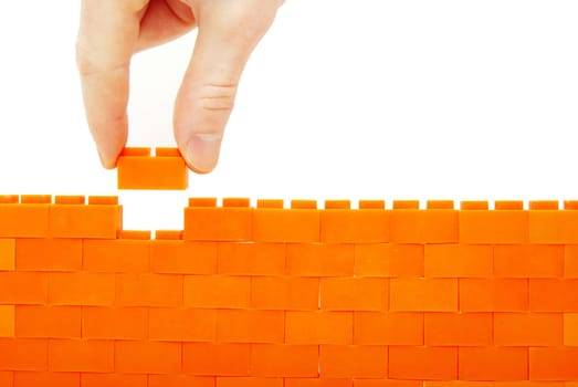 compleeting the wall on a white background