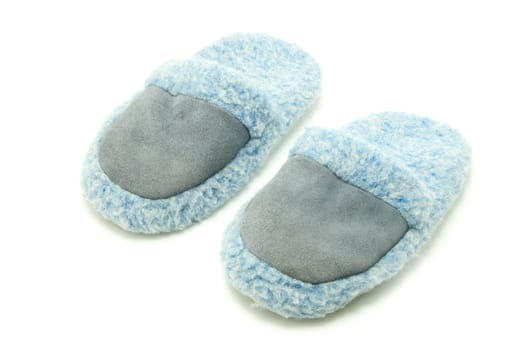 Blue slippers isolated on white