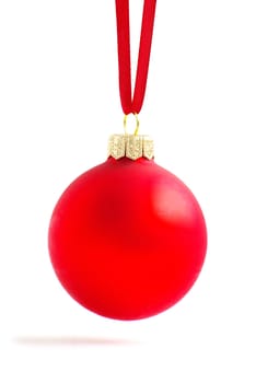 Christmas ball hanging with ribbons on white background