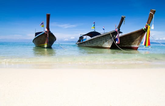 Tropical beach, longtail boats, Andaman Sea, Thailand