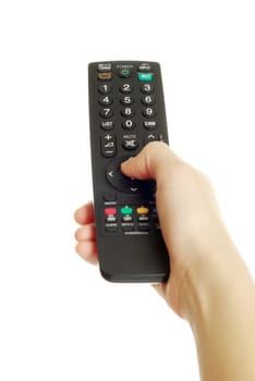 remote control in hand isolated on white background