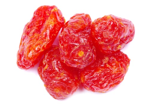 red dried goji berries on white