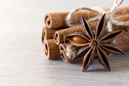 anise and cinnamon, on wooden table..