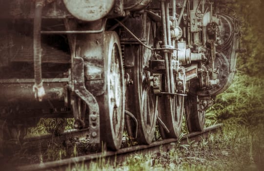 An old and unallocated steam locomotive on the vintage photo.