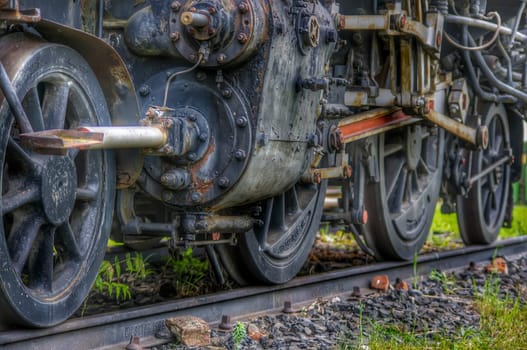 An old and unallocated steam locomotive on the vintage photo.