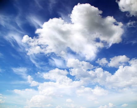 Blue sky background with a tiny clouds