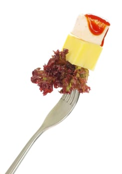 food on a fork isolated on white background