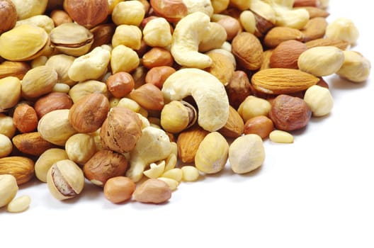 Assorted mixed nuts on white background