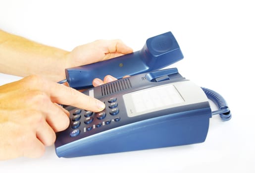 finger with  blue telephone keypad
