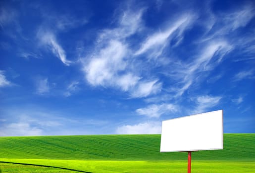 Billboard on a background of the blue sky