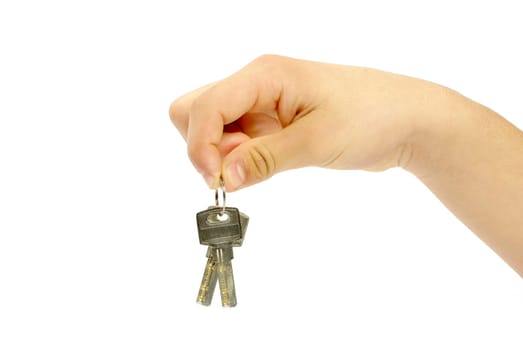 hand holds a key isolated on white