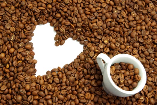 Coffee beans in a white cup