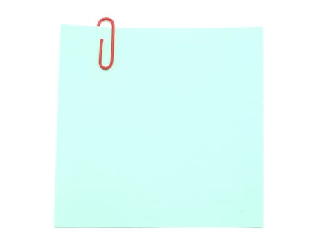 Blank note paper and red paper-clip isolated  on white