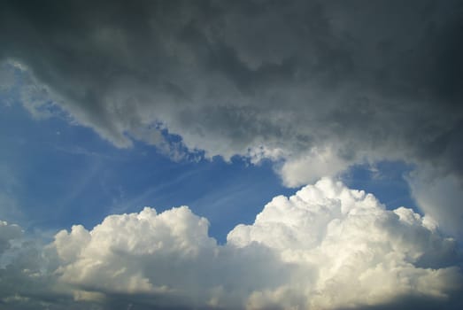 Blue sky background with a tiny clouds