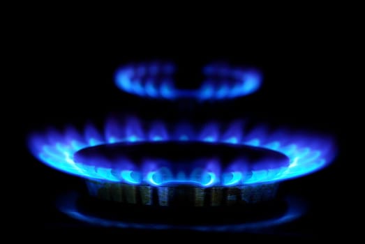 flames of gas stove in the dark