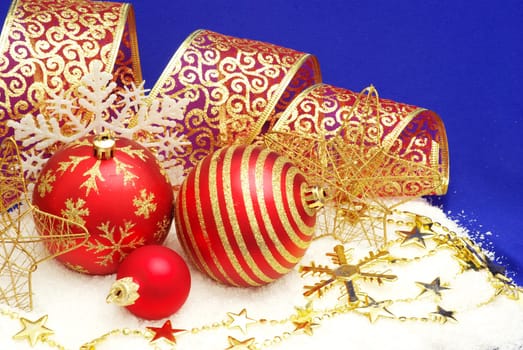 Christmas balls isolated on the blue background