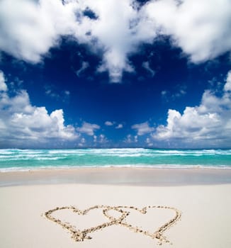 hearts drawn in the sand