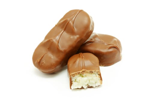 Delicious  chocolate confetti isolated on white