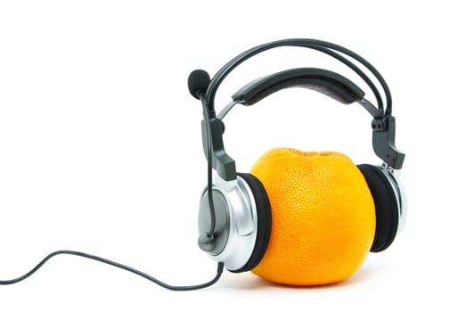 orange and headphones isolated on a white