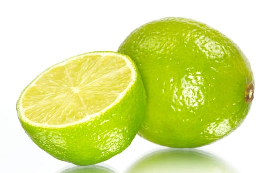 Fresh ripe lime isolated on white background