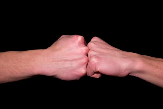 stroke  by a fist in a fist on a black background