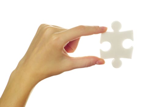puzzle in hand isolated on white background