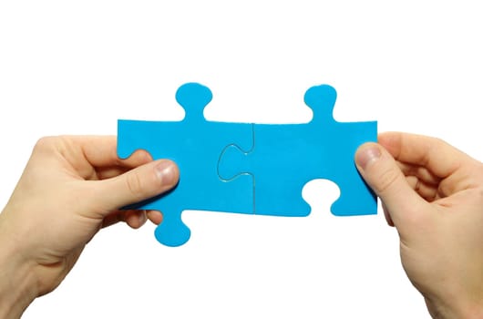 puzzle in hand isolated on white background