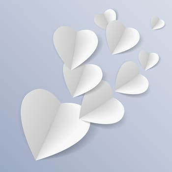 Background with several white folded paper hearts