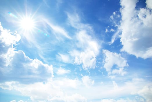 Blue sky background with a tiny clouds