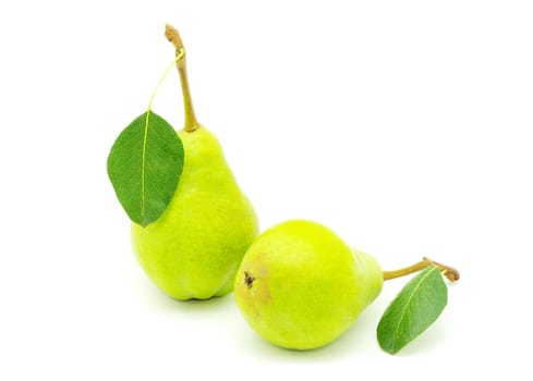 ripe fresh green pear with leaf isolated on white