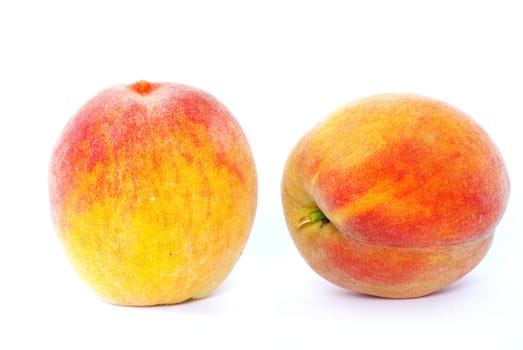 two peach isolated on white
