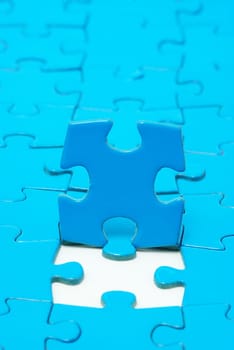 blue puzzles for background. business concept